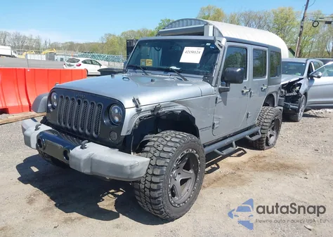 2015 Jeep Wrangler Unlimited Willys Wheeler из США, поврежденный, VIN 1C4BJWDG6FL768265